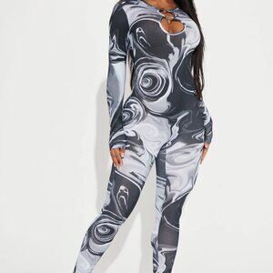 Above And Beyond Printed Jumpsuit (Color Available: Black/Grey)